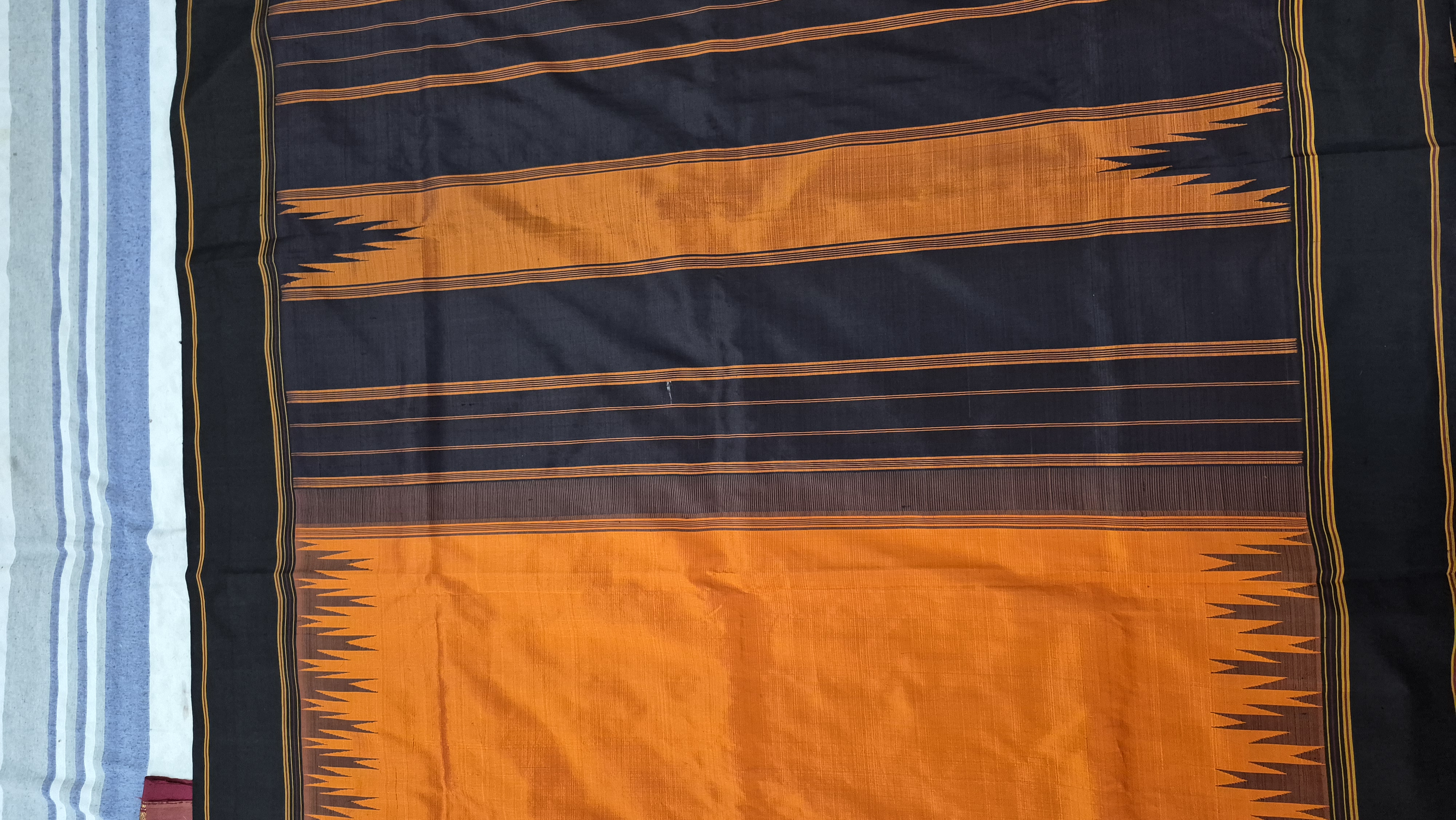 Tussar silk orange and black saree